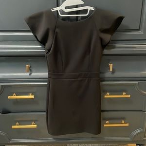 lightly used black bodycon dress. perfect cocktail dress with open back.